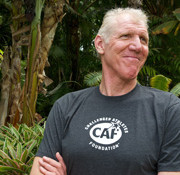 bill walton smiling and looking away from the camera